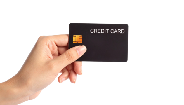 A human hand securely holding a generic black payment card, symbolizing digital transactions, financial literacy, and the convenience of modern banking for everyday purchases