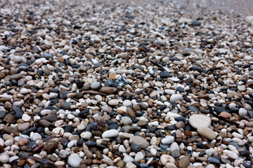 Many beautiful pebbles as background, closeup view