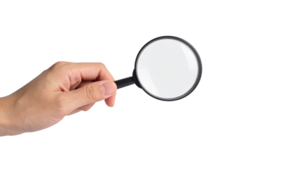 Human hand holding a magnifying glass for close inspection and analysis, symbolizing research, search, and discovery on an isolated white background