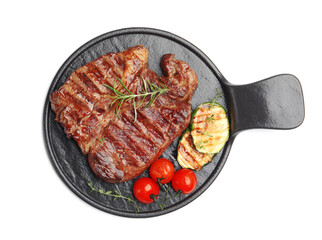 Delicious grilled beef steak with rosemary, zucchini and tomatoes isolated on white, top view