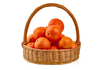 Tangerines in Wicker Basket, isolated on white background