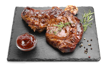 Delicious grilled beef steak with herbs, spices and ketchup isolated on white