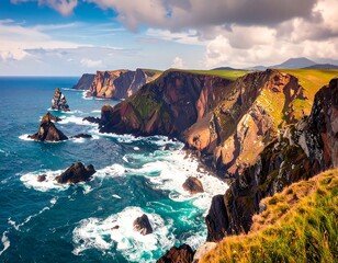 Dramatic coastal cliffs meet churning ocean waves under a vibrant sky