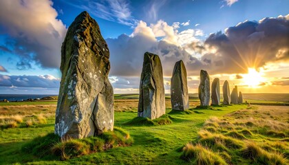 Ancient stones align at sunset.  Vast landscape bathed in golden light
