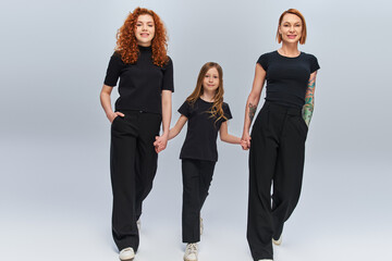 Celebrating the bond of three generations of beautiful red haired women in autumn fashion