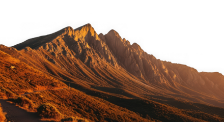 Golden hour illuminates the rugged mountain range with sharp peaks and deep shadows, showcasing the dramatic natural landscape at sunset isolated on transparent background