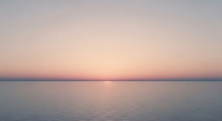 Obraz premium Gentle sunrise over the tranquil sea creates a serene and calming atmosphere, with soft pastel colors painting the sky and reflecting on the water