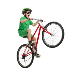 Obraz premium Energetic young cyclist performing a wheelie with focus and determination isolated