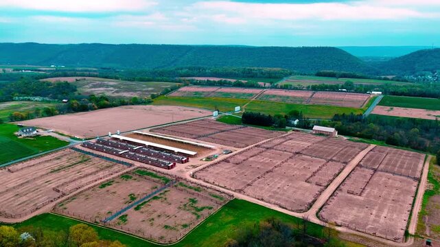Aerial landscape of corn and guinea fowl poultry farm rural Appalachia Central Pennsylvania