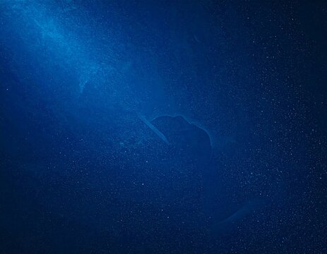 Deep blue abstract background with light streaks - Powered by Adobe