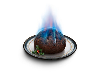 Looking down on a round patterned plate with a sprig of holly and a traditional Christmas pudding soaked in brandy and lit giving blue flames isolated against a transparent background.