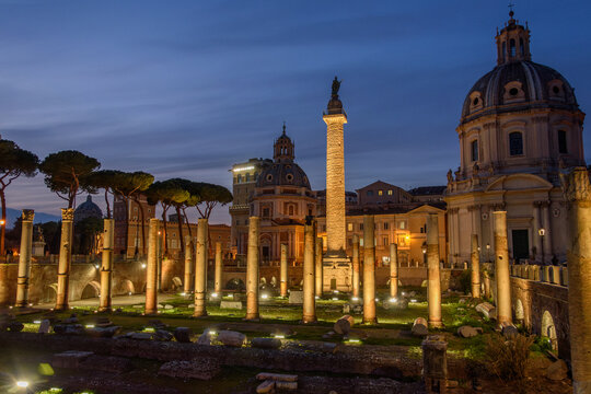 Trajan Column and Forum Illuminated at Night in Rome, Italy