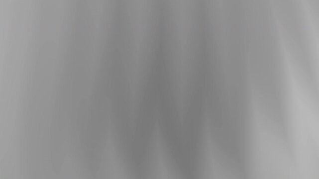 Abstract gray gradient vertical background with blurred streaks, suitable for modern design projects, presentations, websites, and social media graphics.