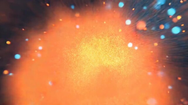 Abstract orange and blue particles bursting with energy