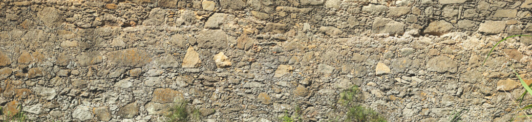 Obraz premium Texture pattern floor base background river sand path road sidewalk wall brick cement retaining granite quarry Portuguese stone pebbles stains design nature miscellaneous