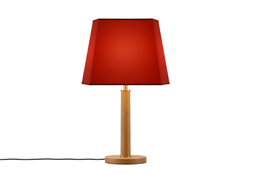 A modern brass table lamp with a vibrant red lampshade isolated on transparent background