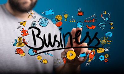 Hand pointing at business word surrounded by icons.  Success, growth, strategy, innovation.