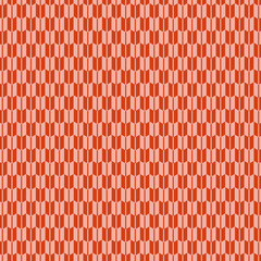 和柄の矢絣柄で赤系色