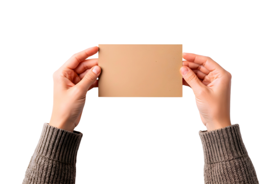 Hands holding a small blank brown cardboard square isolated on transparent background