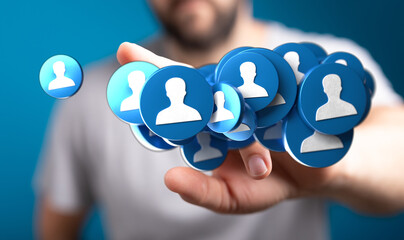 Conceptual image of a hand presenting person icons, symbolizing networking, online connections, and...