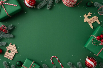 A festive holiday scene featuring wrapped presents, ornaments, candy canes, pine branches, and...