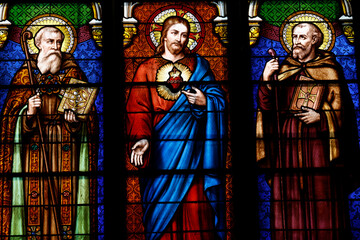 Fototapeta premium Saint Seine church. Stained glass. Saint Seine, Jesus Christ dans Saint Leonard. Corbigny. France.