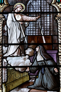 Saint Laurent church.  Stained glass. The apparitions of the Sacred Heart to Saint Margaret Mary Alacoque.  Tavernay. France.