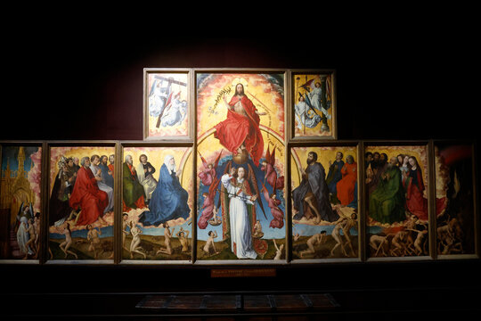 The Hospices de Beaune. Rogier Van Der Weyden (1399-1468) polyptych altarpiece. Detail. The last Judgment. Archangel Saint Michael weighing souls.  Beaune. France.