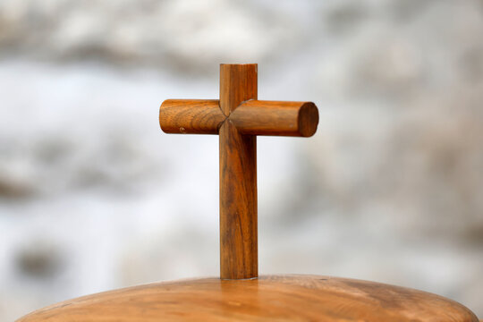 Praz sur Arly church. Christian cross on baptistery.  France.