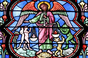 Fototapeta premium Bayeux cathedral. Stained glass. Saint Michael. The Last Judgment. The Weighing of Souls. Bayeux. France.