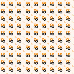 Seamless pattern of orange and black circles on beige