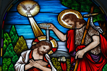 Obraz premium Stained glass. The baptism of Jesus by John the Baptist. Church of Fatima. Ho Chi Minh city. Vietnam.