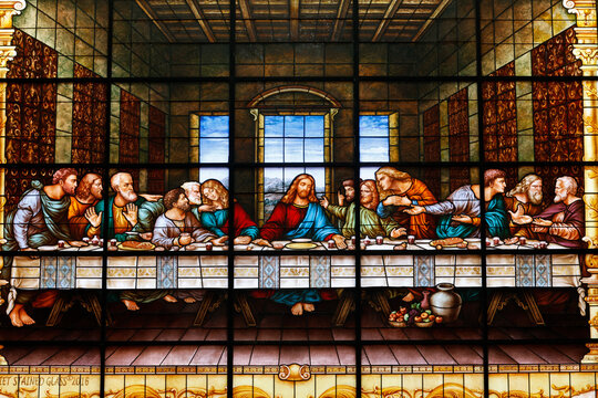 Stained glass. Passion of Christ. The last supper. Jesus and his apostles. Church of Fatima. Ho Chi Minh city. Vietnam.