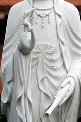 Vinh Nghiem Buddhist Pagoda.  Guan Yin, Guanyin, Quan Am, name for Avalokiteshvara, the bodhisattva of compassion which is usually represented as a female figure.  Ho Chi Minh city. Vietnam.