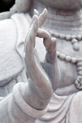 Vinh Trang buddhist Pagoda.  Guan Yin, Guanyin, Quan Am, name for Avalokiteshvara, the bodhisattva of compassion which is usually represented as a female figure.  Mudra. My Tho Vietnam.