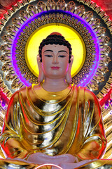 Obraz premium Phat Ngoc Xa Loi Pagoda Vinh Long (Jade Buddha). Buddha sitting in the lotus position. Meditation. Vinh Long. Vietnam.