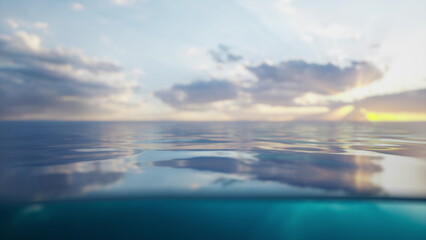 A stunning sunset reflects on tranquil ocean waters, as soft clouds drift across the sky. Gentle waves ripple and create a peaceful ambiance at dusk, inviting relaxation and contemplation.