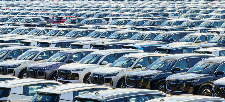 Russia, Kaluga, AGR Automotive Group - July 7, 2025: New Chery and Tenet cars parked at factory storage lot. Vehicle import and export. Automobile logistics and transportation.