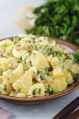 A bowl with Greek potato salads
