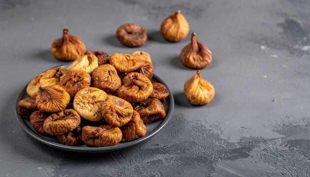 Wholesome Dried Figs: Sweet Natural Snack on Dark Textured Background