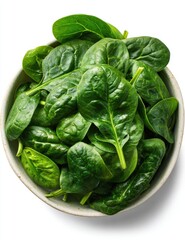 Fototapeta premium Fresh spinach leaves in a bowl