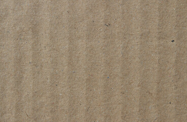 Light and slightly wavy cardboard background