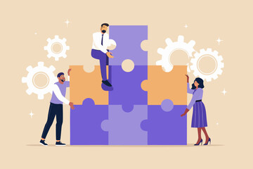 Diverse team of business people collaborating to assemble a large puzzle together symbolizing teamwork and strategy