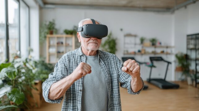 Senior man wearing virtual reality headset is engaging in immersive experience, standing in modern room filled with plants and fitness equipment, showcasing technology and active lifestyle - Powered by Adobe