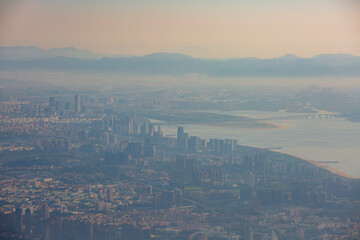 Aerial view of Xiamen city morning fog scenery, China