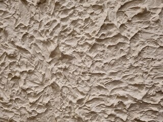 white walls with embossed paint motifs