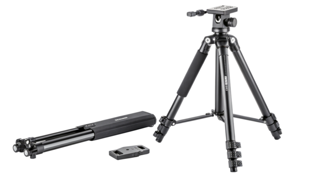 A professional black tripod with a carrying case and quick release plate, isolated on transparent background