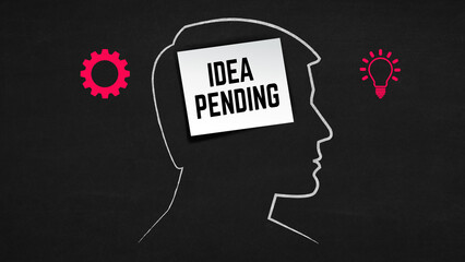 Idea Pending Text Banner Showing Human Head Silhouette with Blank Sticky Note on Chalkboard Background.