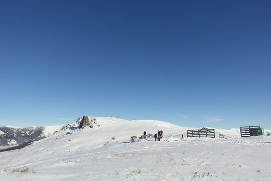 winter landscapes of the old mountain. stara planina ski center in winter, the surroundings of babin zub and the jabucko ravniste, ski slopes with skiers