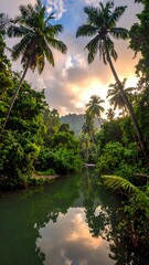 Tropical river valley at sunrise. Lush greenery reflects in still water